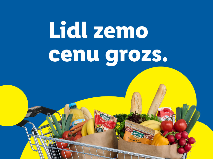 Lidl iepirkumu ratiņi, kas piepildīti ar svaigiem produktiem, maizi un Alesto riekstiem, uz zila fona ar dzelteniem apļiem.