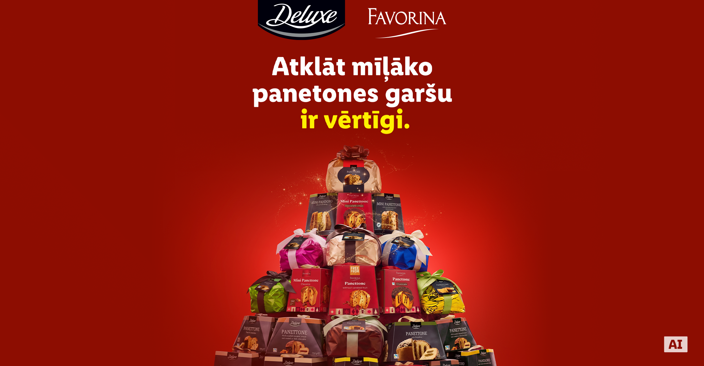 Ziemassvētku panetones un pandoro kūku piramīda uz sarkana fona ar svētku tekstu.