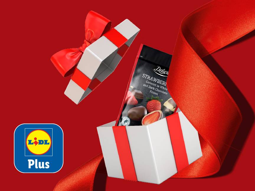 Lidl Plus dāvana: Delux zemenes šokolādē, sarkanā lentē.