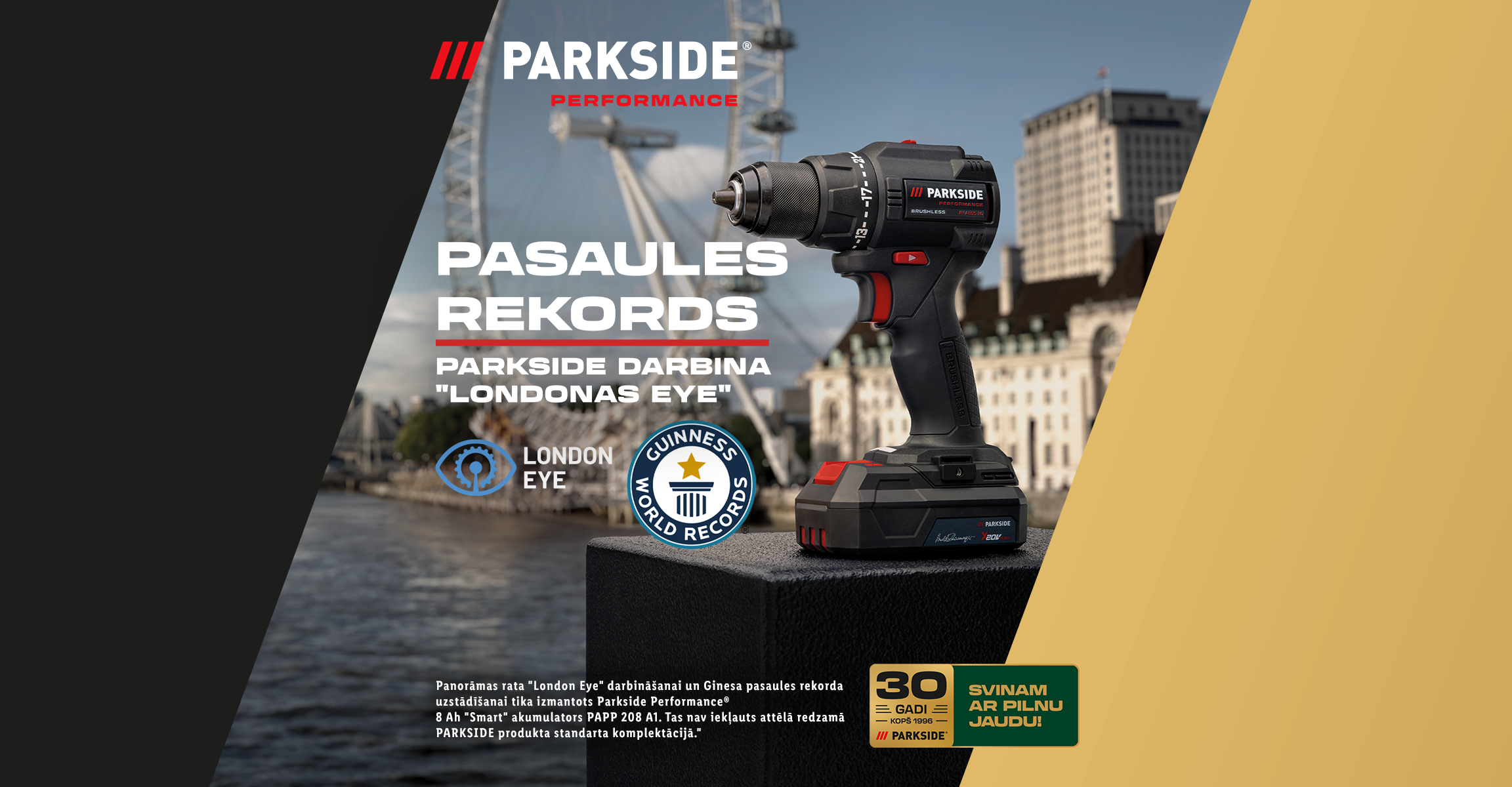 Urbjmašīna ar Guinness pasaules rekorda zīmi un Londonas panorāmu, svinot 30 gadus.