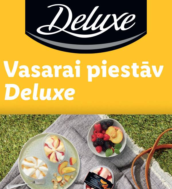 Deluxe vasaras deserts ar persiku un vaniļas garšu, baudāms piknikā.